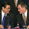 Homeland Security Secretary Tom Ridge and Surakiart Sathiratathai, Foreign Minister, Kingdom of Thailand, at a Container Security Initiative signing.