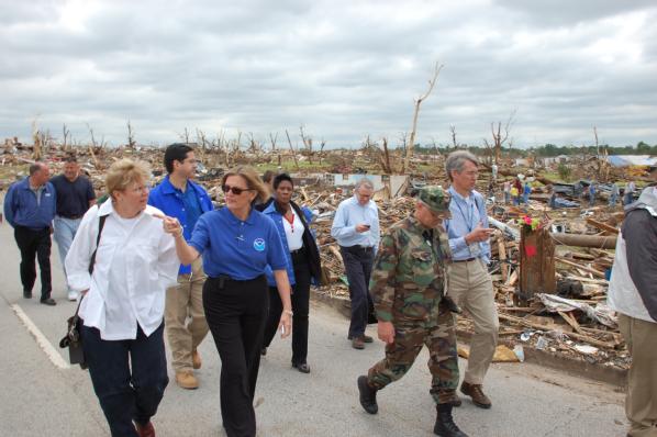 Photo of U.S. Department of Homeland Security Deputy Secretary Jane Holl Lute (left) touring tornado damage in Joplin, MO