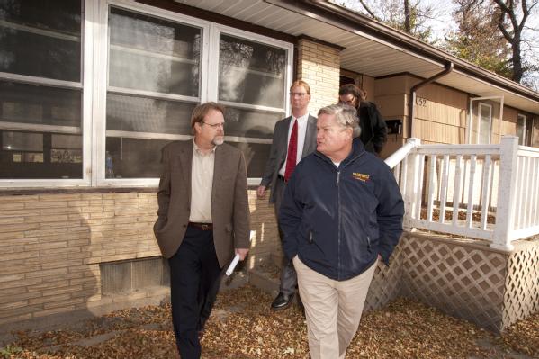 Minot, ND, October 20, 2011 -- David Miller (second in line), Associate Administrator of the FEMA's Federal Insurance and Mitigation Administration, arrives in Minot with other federal and local officials.  FEMA is working with state and local partners to provide assistance to those affected by June's historic Souris River flood in Minot.