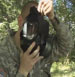 Indiana National Guard Soldier puts on gas mask