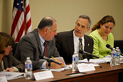CBP Commissioner Alan Bersin, center right, confers with Deputy Assistant Treasury Secretary Timothy Skud, center left, during a meeting with the Advisory Committee on Commercial Operations held on December 7.  Ellen McClain, acting chief of staff, DHS Office of Policy, left, and Maria Luisa O’Connell, CBP’s senior advisor for trade and public engagement, listen intently.  