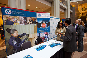 Attendees at the Trade Symposium learn more about various CBP programs at information booths. 