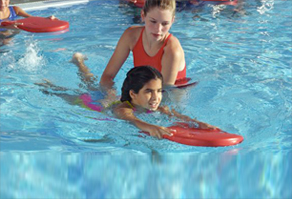 Girl Teaching Children About Water Safety