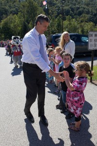 Duncan greets students at Elk Elementary.