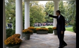 President Obama Waves From The Colonnade