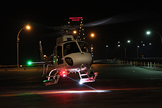 A Great Lakes OAM ASTAR-350 takes off from in front of the primary lanes at the Ambassador Bridge after dropping off a team member from the incident command. 