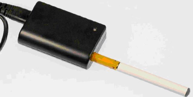 Image of an e-Cigarette inserted into a charger.