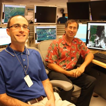 Photo: NHC welcomes Prof. Ryan Torn this week as part of our Visiting Scientist Program. Ryan's area of expertise includes tropical cyclone genesis, effects of uncertainty upon forecasts, and tropical cyclone data assimilation.  He is seen on the left side of this photo next to NHC Science and Operations Officer Dr. Chris Landsea.
Read more about the program at http://www.nhc.noaa.gov/news/20120730_pa_visitingScientists.pdf