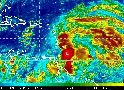 Photo: A broad area of low pressure is located over the eastern Caribbean Sea this morning, centered about 60 miles northwest of St. Lucia. 
Although the system is likely producing winds to tropical  storm force in the rain bands, the satellite and surface data suggest that the low still does not have a closed circulation. 
Upper-level winds are forecast to become more conducive for development, and it has a high chance of becoming a tropical cyclone during the next 48 hours while moving toward the northwest or north-northwest. A tropical storm warning could be required for portions of the Leeward Islands.
Strong and gusty winds along with heavy rainfall are possible across portions of the Lesser Antilles during the next couple of days.
A USAF Hurricane Hunter plane is scheduled to investigate the system this afternoon.
Get the latest on the tropics anytime by visiting the NOAA NHC website at www.hurricanes.gov