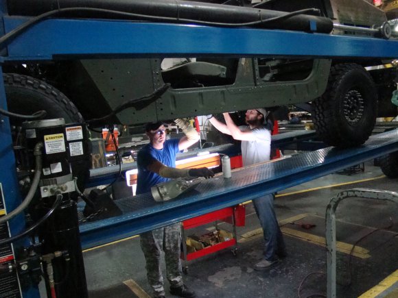 In mid 2004, employees could only produce three vehicles per week. Through lean techniques, Red River revamped the entire Humvee repair process from bay style to a complete assembly line.