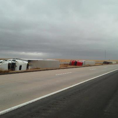 Photo: Strong winds in the Plains today have caused travel disruptions from the Dakotas to Oklahoma.  This picture shows several trucks blown over on Interstate 90 near Belvidere, SD.  This is just one of several reports of traffic accidents in the region caused by strong winds and/or blowing dust.