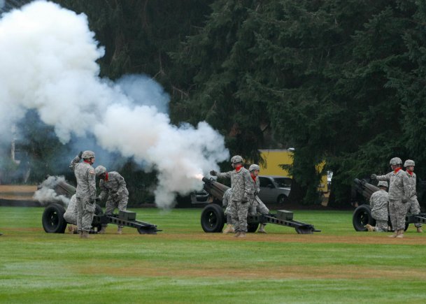 Soldiers with 1st Battalion, 94th Field Artillery Regiment, 17th Fires Brigade, fire their Howitzers during the reactivation ceremony for the 7th Infantry Division, Oct. 10, 2012, at Joint Base Lewis-McChord, Wash. The battalion was the ceremony's official firing battery. The 17th Fires Brigade is one of the 7th Infantry Division's five subordinate brigades.