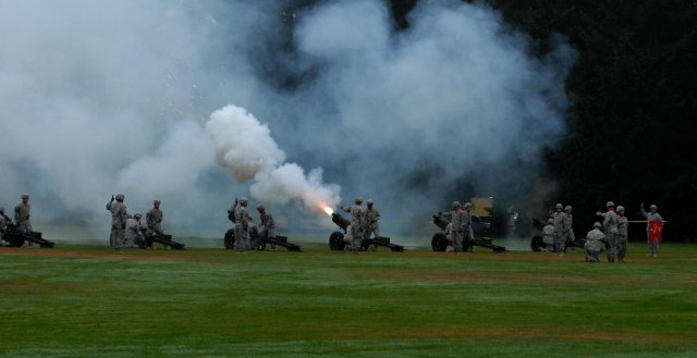 Soldiers with 1st Battalion, 94th Field Artillery Regiment, 17th Fires Brigade, fire their Howitzers during the reactivation ceremony for the 7th Infantry Division, Oct. 10, 2012, at Joint Base Lewis-McChord, Wash. The battalion was the ceremony's official firing battery. The 17th Fires Brigade is one of the 7th Infantry Division's five subordinate brigades.