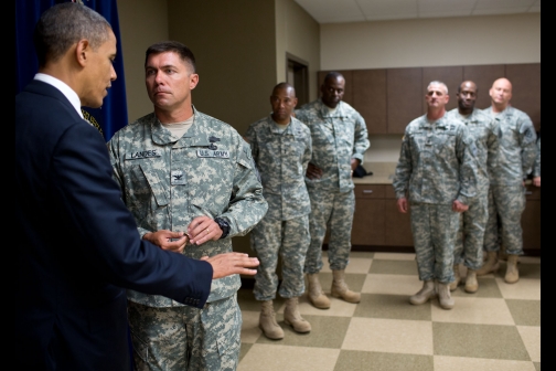 President Obama Talks With Troops Backstage