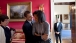 President Barack Obama hugs First Lady Michelle Obama in the Red Room