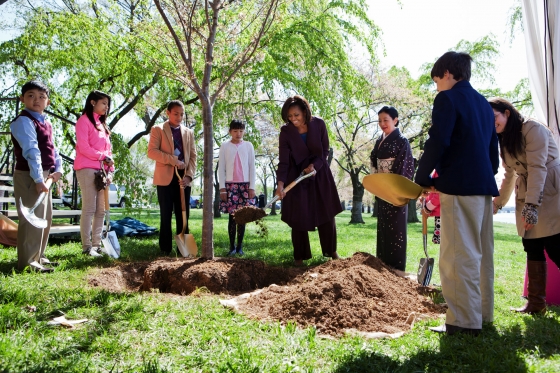 First Lady Michelle Obama participates in a centennial tree planting ceremony during the National Cherry Blossom Festival (March 27, 2012)