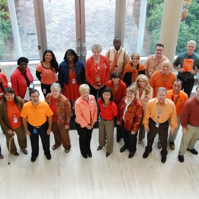 Photo: Department of Defense Elementary and Secondary Schools Area Service Center staff Make it Orange to Make it End in recognition of Unity Day on October 10th