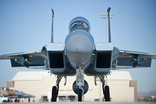 <p>An F-15D Eagle piloted by Capt. David Vincent, 65th Aggressor Squadron pilot, with retired United States Air Force Brig. Gen. Chuck Yeager taxis to the runway before taking off Oct 14, 2012, at Nellis Air Force Base, Nev. This flight marks the 65th anniversary of Yeager's breaking of the sound barrier.(DoD photo by Airman 1st Class Jason Couillard, U.S. Air Force/Released)</p>