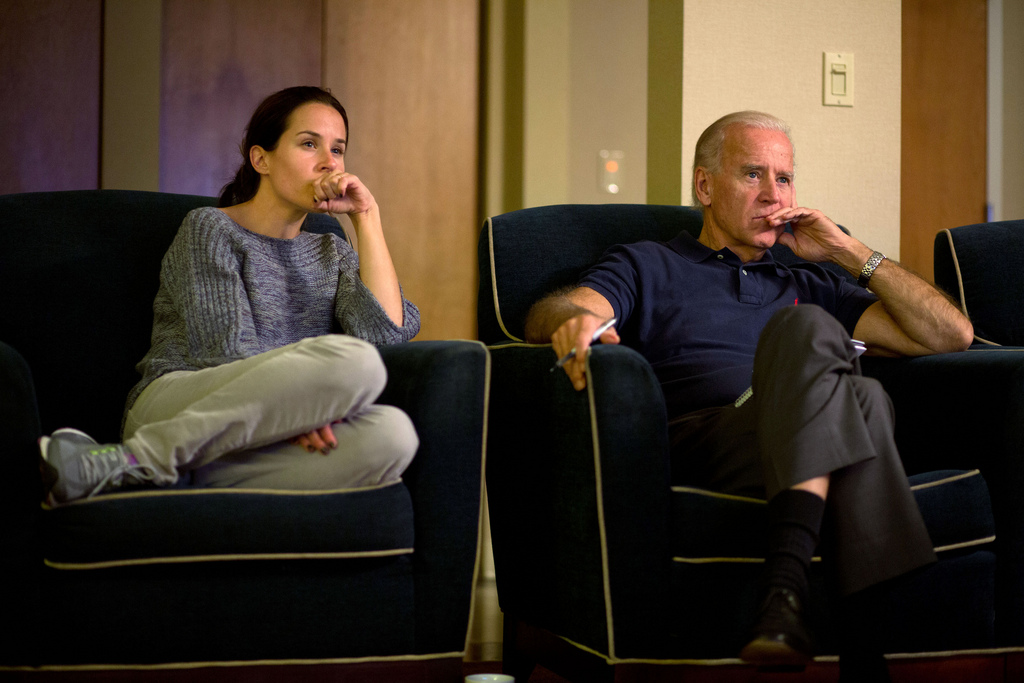 <p>Vice President Joe Biden and his daughter Ashley Biden watch the third presidential debate from a hotel room in Toledo, Ohio, Oct. 22, 2012. (Official White House Photo by David Lienemann)<br />
 <br />
This official White House photograph is being made available only for publication by news organizations and/or for personal use printing by the subject(s) of the photograph. The photograph may not be manipulated in any way and may not be used in commercial or political materials, advertisements, emails, products, promotions that in any way suggests approval or endorsement of the President, the First Family, or the White House.</p>