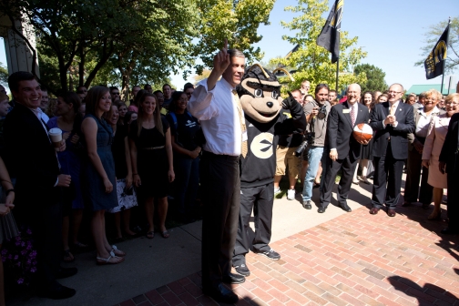 Secretary Duncan stands with Corky