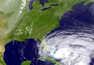 Image: NOAA satellite image showing Hurricane Sandy moving northward across eastern Cuba (© NOAA/AP)