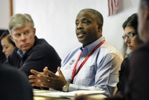 FEMA Federal Coordinating Officer Philip E. Parr, center, speaks during a meeting with state and local officials during a Prattsville Recovery Executive Meeting on the towns recovery efforts.