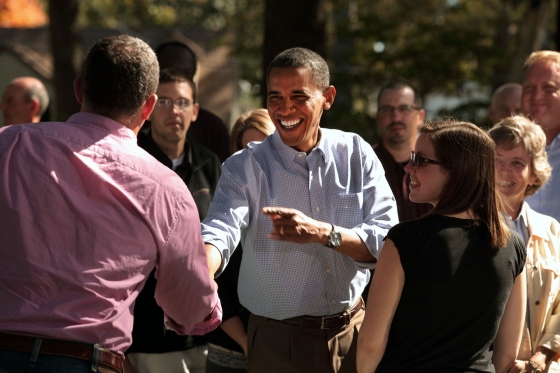 President Barack Obama Shakes Hands with Neighborhood Families in the Backyard of Jeff and Sandy Clubb's Home in Des Moines, Iowa