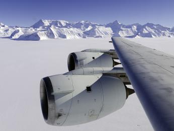 NASA’s DC-8 flying laboratory passes Antarctica’s tallest peak, Mount Vinson, on Oct. 22, 2012, during a flight over the continent to measure changes in the massive ice sheet and sea ice.