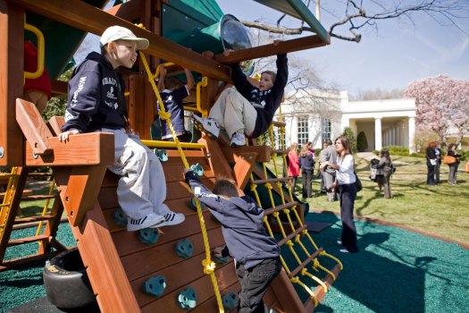 The Children’s Miracle Network Champions play on the White House swingset