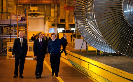 President Barack Obama tours the General Electric plant in Schenectady, N.Y., with Jeff Immelt, CEO and Chairman of General Electric, left,  and Kevin Sharkey, GE Infrastructure/Plant Manager,  Jan. 21, 2011. 