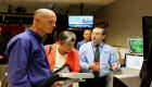 Department of Homeland Security Secretary Janet Napolitano and Florida Governor Rick Scott are briefed about hurricane forecasting by NHC hurricane specialist unit branch chief James Franklin.
