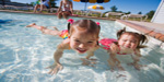 Photo:  Kids swimming in pool