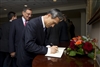 Secretary Panetta watches as South Korea's Minister of National Defense Kim Kwan-jin signs the guest book in the Pentagon 
