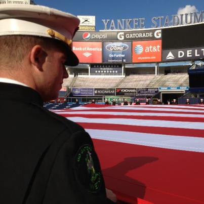 Photo: Seventy-five Cadets practice unfurling a large American flag Oct. 10, at Yankee Stadium in preparation for Game 3 of tonight’s American League Division Series between the New York Yankees and Baltimore Orioles. Other West Point elements in attendance are a five-person Cadet Color Guard and a soloist from the West Point Band, who will sing God Bless America during the seventh-inning stretch. (U.S. Army photo by Frank DeMaro/USMA PAO)