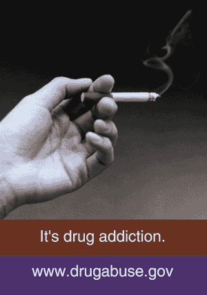 Hand holding lit cigarette - Caption It's Drug Addiction