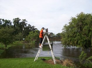 Alligator Cr at Kapok Pk. Suzana Hernandez servicing rain gage