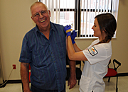 A Veteran receives a flu shot
