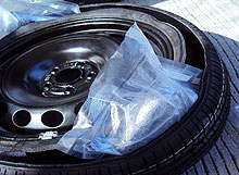 A vehicle search revealed 16.76 pounds of cocaine inside the spare tire.  