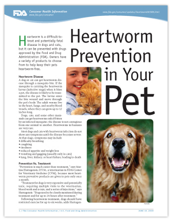 cover page of pdf article with child holding a yellow cat and a Golden Retriever smiling at the camera