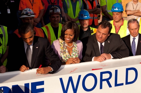 President Barack Obama signs a steel beam at the One World Trade Center site 