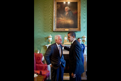 President Barack Obama talks alone with Sen. Edward Kennedy