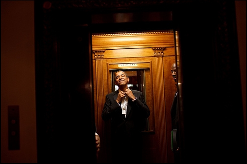 President Barack Obama rides the elevator to the Private Residence