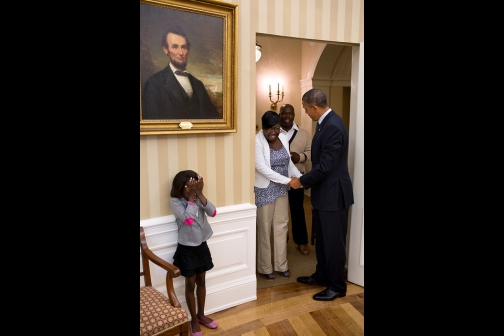 Eight-year old Make-A-Wish child Janiya Penny reacts after meeting President Obama