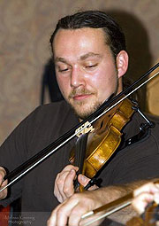 Daniel Boucher playing the fiddle.