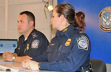 CBP Port of Chicago Officers Alfredo Rivera and Elvira Diaz on the set of Customs and Border Protection with Director David Murphy.