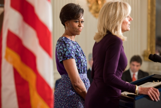 First Lady Michelle Obama listens as Dr. Jill Biden delivers remarks to a bipartisan group of governors attending the National Governors Association’s meeting