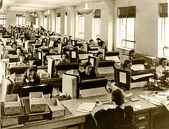 Workers entering data on punch cards for the 1940 Census