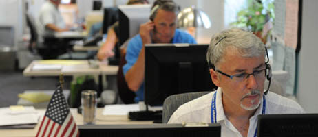 Photo of operators answering calls for the Veterans' Crisis Line.