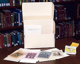 Cordel chapboks shown with their envleopes and manuscript box at the American Folklife Center