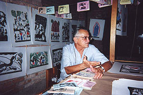 J. Borges with his cordel and larger block prints.
